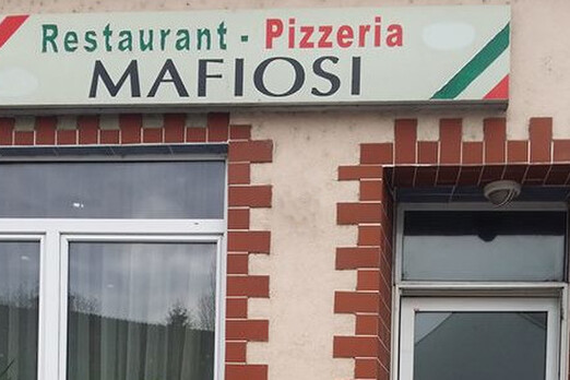 Eingang zur Pizzeria Mafiosi in Wilfleinsdorf für Tischreservierung vor Ort